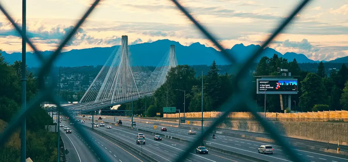 Port Mann Bridge and Highway 1 traffic at sunset in Surrey